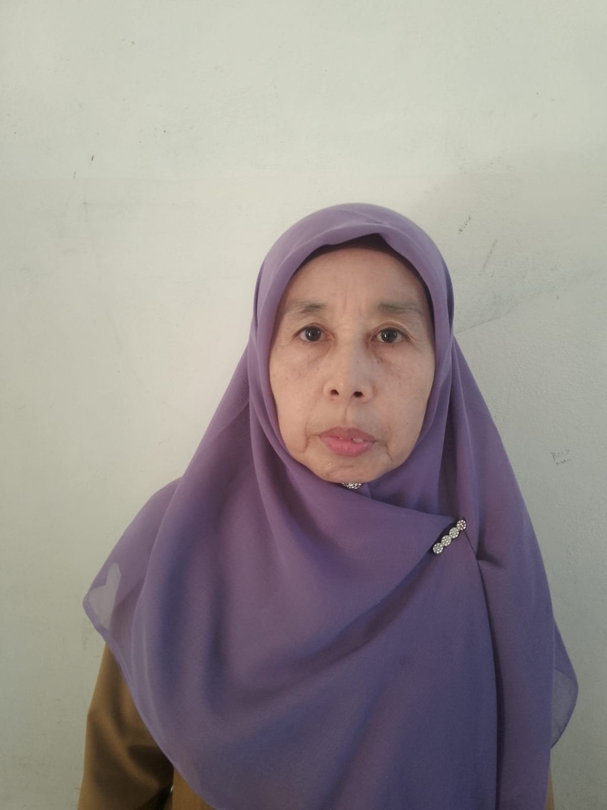 <center>Kepala Perpustakaan<br>Astuti. M</center>